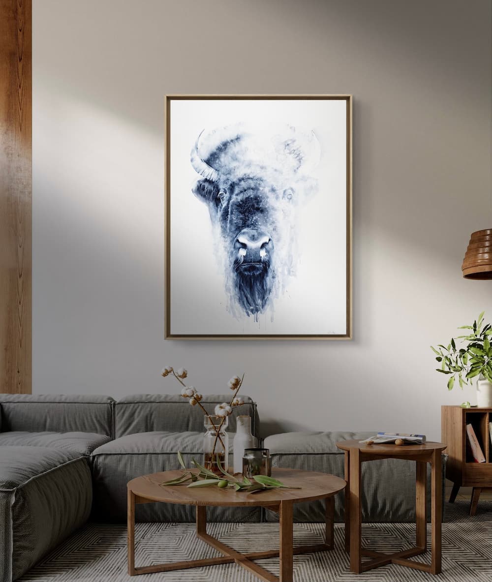 Buffalo watercolor hanging above a sideboard