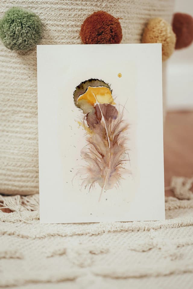 Goldfinch shown in a room setting