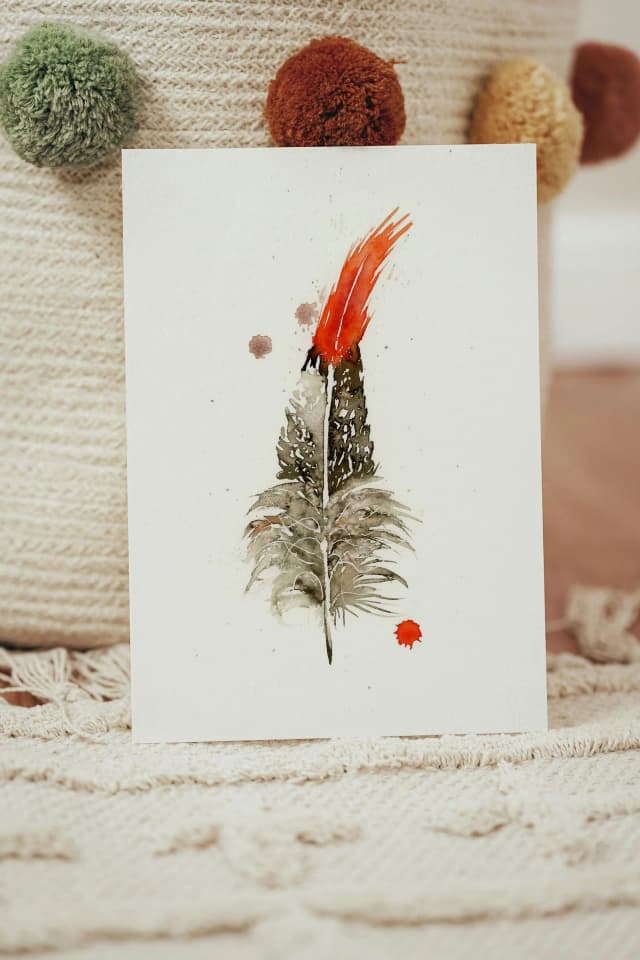 Northern Cardinal shown in a room setting